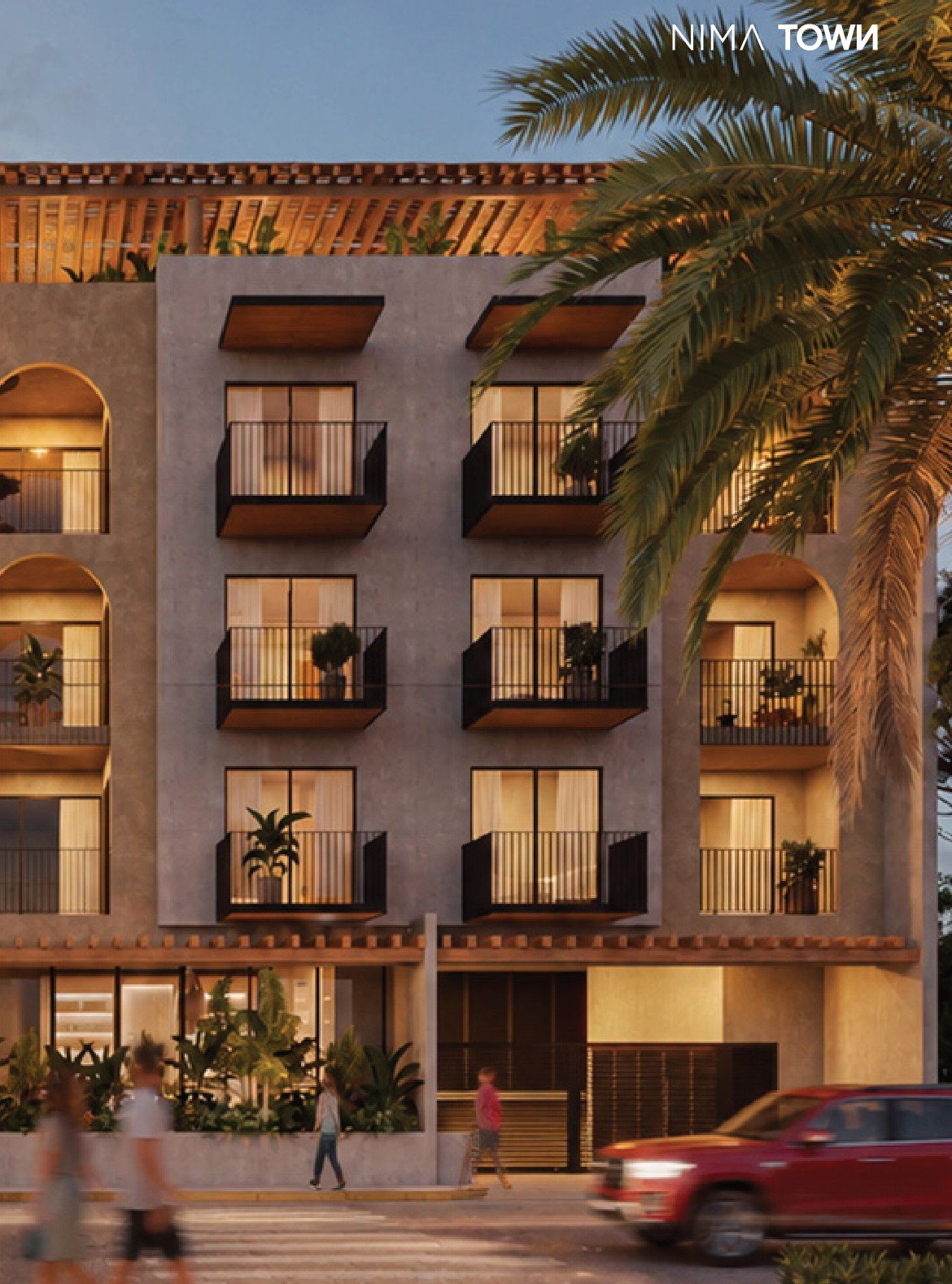Fachada de Nima Town, balcones y palmera