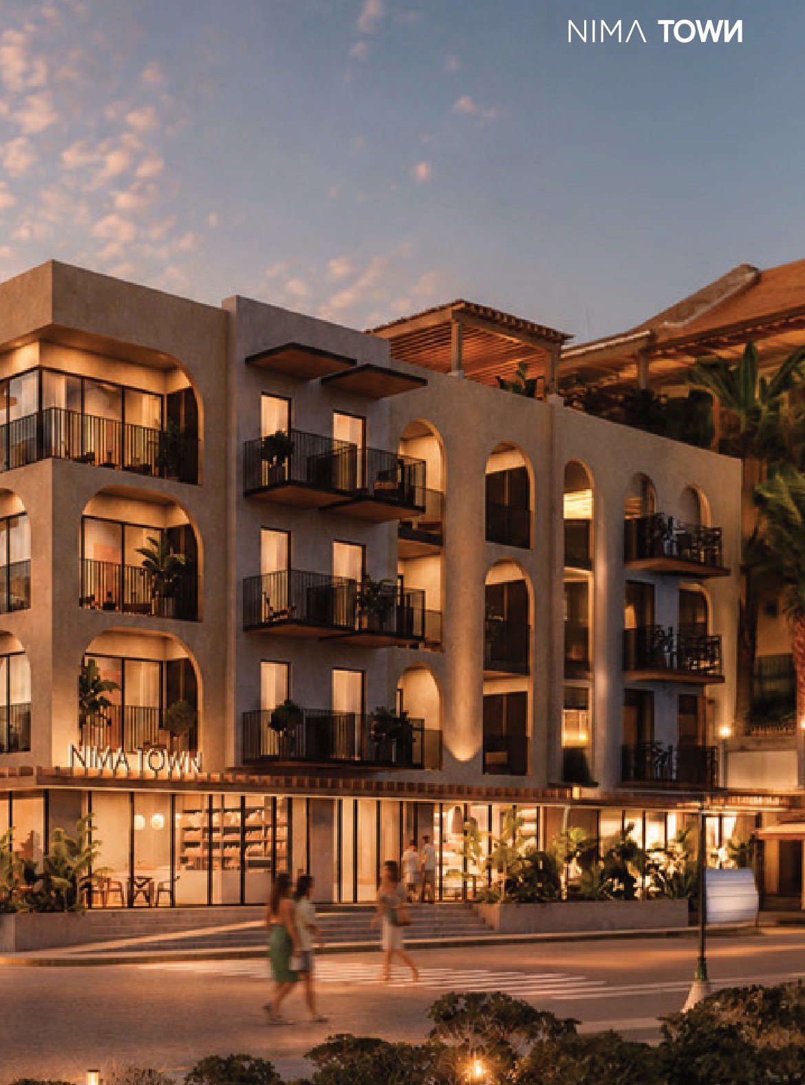 Fachada de Nima Town con locales en planta baja